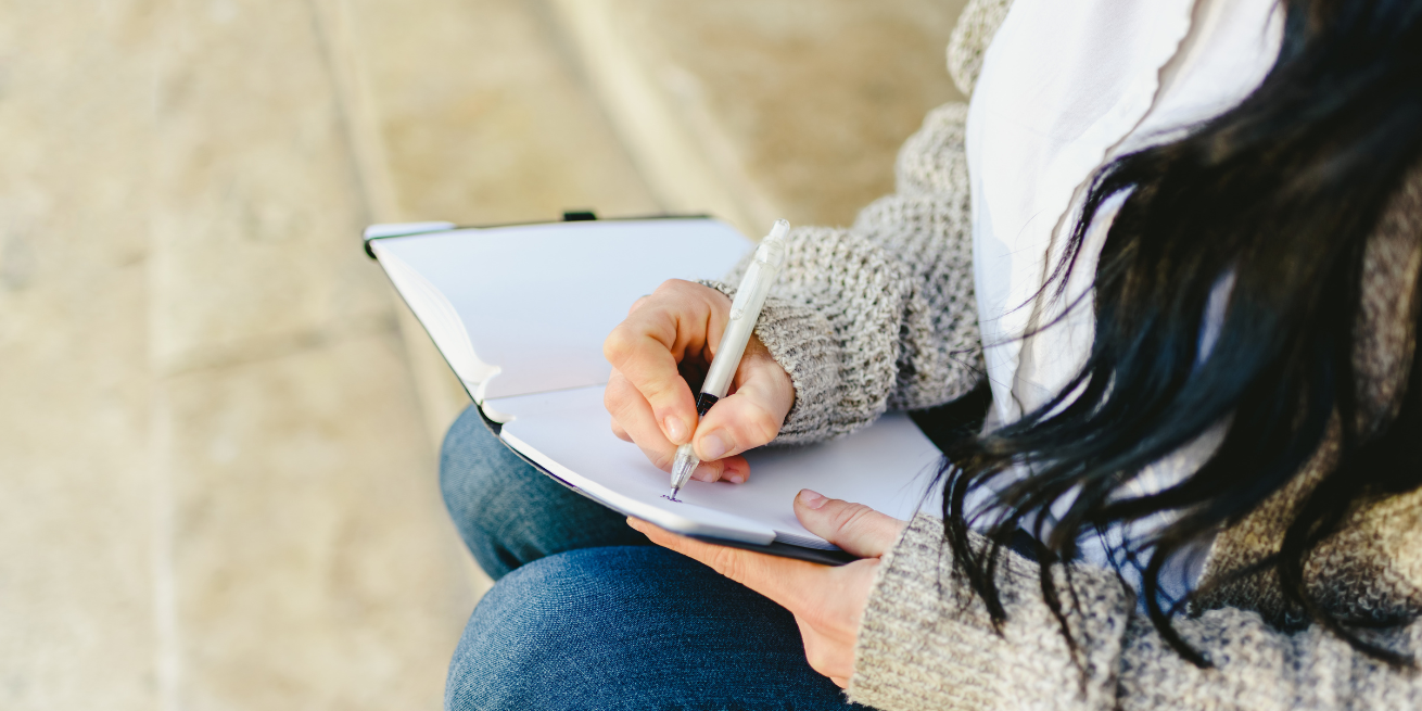 image of woman journaling this year