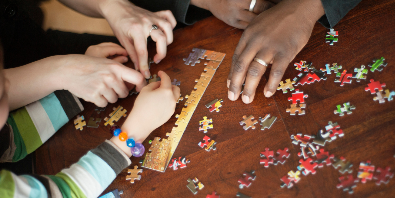 family doing a puzzle together