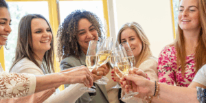 image of girlfriends drinking champagne