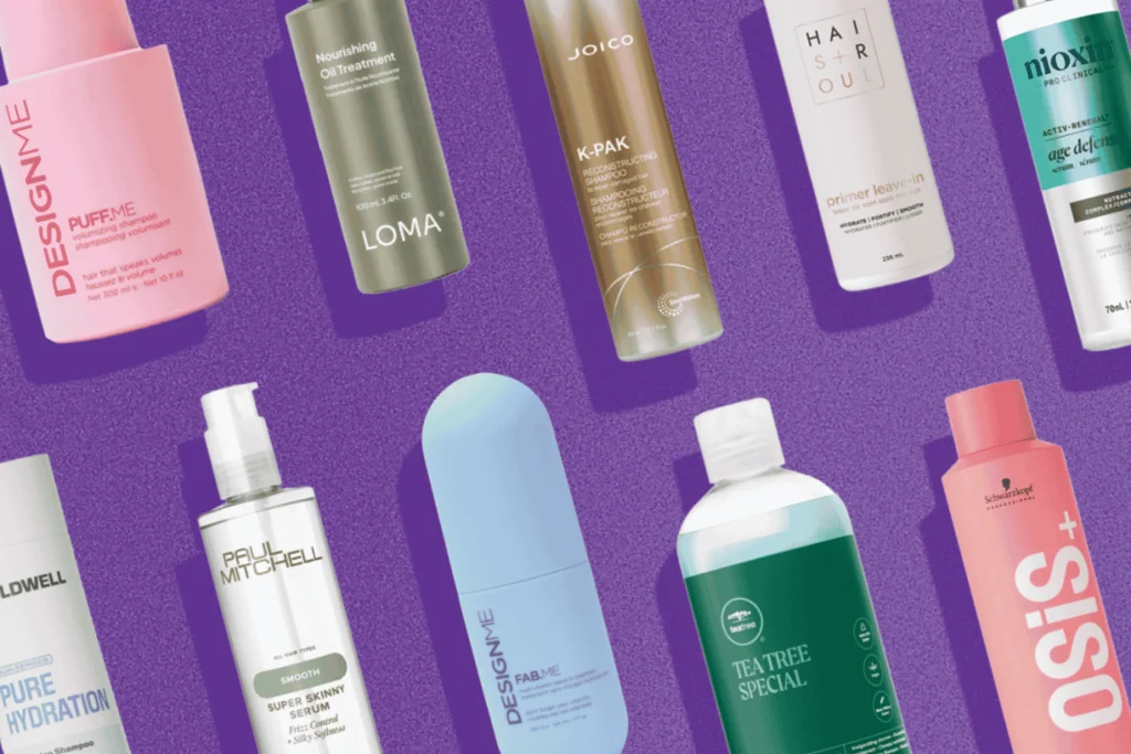 Haircare and styling products from DesignMe, Loma, Joico, Paul Mitchell, Nioxin and Schwarzkopf on a purple background